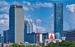 Preview wallpaper city, buildings, trees, river, aerial view