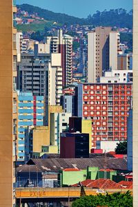 Preview wallpaper city, buildings, trees, colorful, aerial view