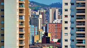 Preview wallpaper city, buildings, trees, colorful, aerial view