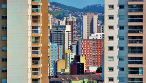 Preview wallpaper city, buildings, trees, colorful, aerial view