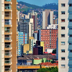 Preview wallpaper city, buildings, trees, colorful, aerial view