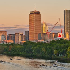 Preview wallpaper city, buildings, trees, water, twilight