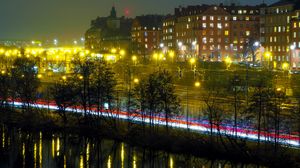 Preview wallpaper city, buildings, trees, light, twilight