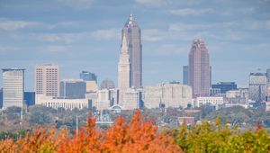 Preview wallpaper city, buildings, trees, autumn