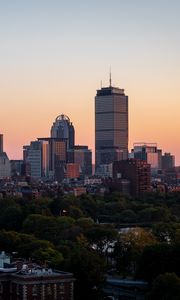 Preview wallpaper city, buildings, trees, sunset, aerial view