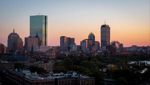 Preview wallpaper city, buildings, trees, sunset, aerial view