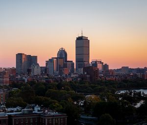 Preview wallpaper city, buildings, trees, sunset, aerial view