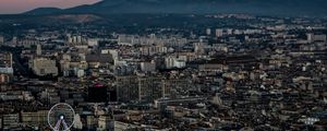 Preview wallpaper city, buildings, valley, mountains, dusk