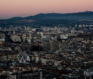 Preview wallpaper city, buildings, valley, mountains, dusk