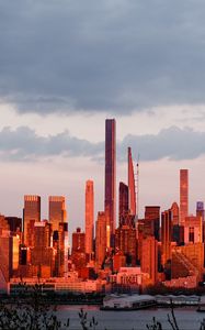 Preview wallpaper city, buildings, water, architecture, twilight