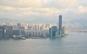 Preview wallpaper city, buildings, water, aerial view, light