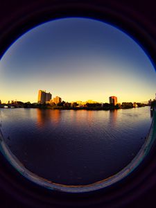 Preview wallpaper city, buildings, water, porthole, view
