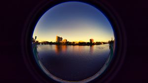 Preview wallpaper city, buildings, water, porthole, view