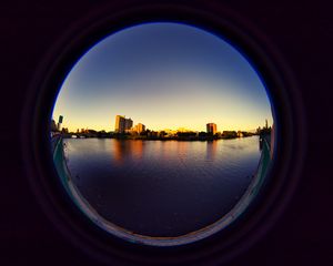 Preview wallpaper city, buildings, water, porthole, view