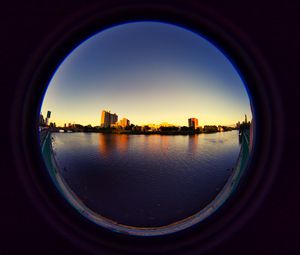 Preview wallpaper city, buildings, water, porthole, view