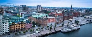 Preview wallpaper city, buildings, water, boat, aerial view