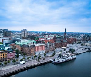 Preview wallpaper city, buildings, water, boat, aerial view