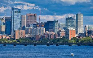 Preview wallpaper city, buildings, water, boat