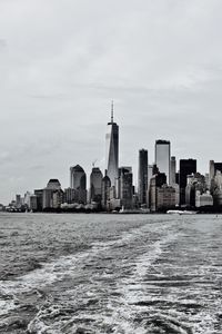 Preview wallpaper city, buildings, water, waves, metropolis, black and white