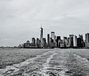 Preview wallpaper city, buildings, water, waves, metropolis, black and white