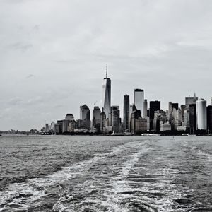 Preview wallpaper city, buildings, water, waves, metropolis, black and white