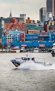 Preview wallpaper city, buildings, water, boat, pier