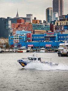 Preview wallpaper city, buildings, water, boat, pier