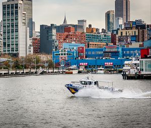 Preview wallpaper city, buildings, water, boat, pier