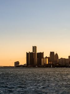 Preview wallpaper city, buildings, water, sky, twilight