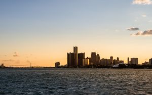 Preview wallpaper city, buildings, water, sky, twilight