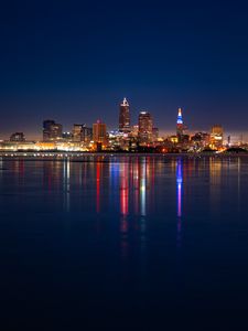 Preview wallpaper city, buildings, water, lights, twilight, reflection
