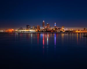 Preview wallpaper city, buildings, water, lights, twilight, reflection