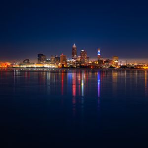 Preview wallpaper city, buildings, water, lights, twilight, reflection