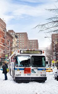 Preview wallpaper city, bus, traffic, snow, winter, people, life