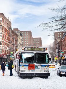 Preview wallpaper city, bus, traffic, snow, winter, people, life