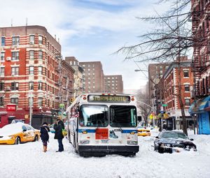 Preview wallpaper city, bus, traffic, snow, winter, people, life
