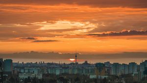 Preview wallpaper city, cityscape, buildings, sun, sunset