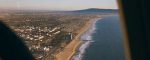 Preview wallpaper city, coast, aerial view, porthole, airplane