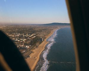 Preview wallpaper city, coast, aerial view, porthole, airplane