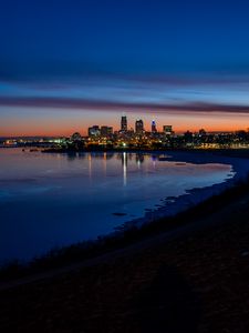 Preview wallpaper city, coast, buildings, water, reflection, night