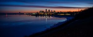 Preview wallpaper city, coast, buildings, water, reflection, night