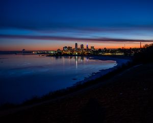 Preview wallpaper city, coast, buildings, water, reflection, night