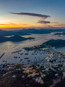 Preview wallpaper city, coast, mountains, sunset