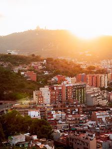 Preview wallpaper city, dawn, aerial view, sunlight, buildings