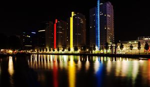 Preview wallpaper city, embankment, lights, colorful, reflection, buildings