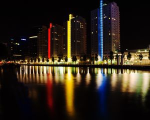 Preview wallpaper city, embankment, lights, colorful, reflection, buildings