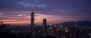 Preview wallpaper city, evening, lights, sunset, buildings