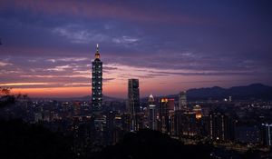 Preview wallpaper city, evening, lights, sunset, buildings