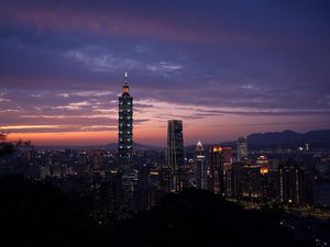 Preview wallpaper city, evening, lights, sunset, buildings
