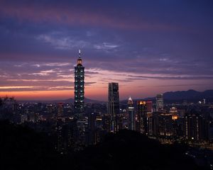 Preview wallpaper city, evening, lights, sunset, buildings
